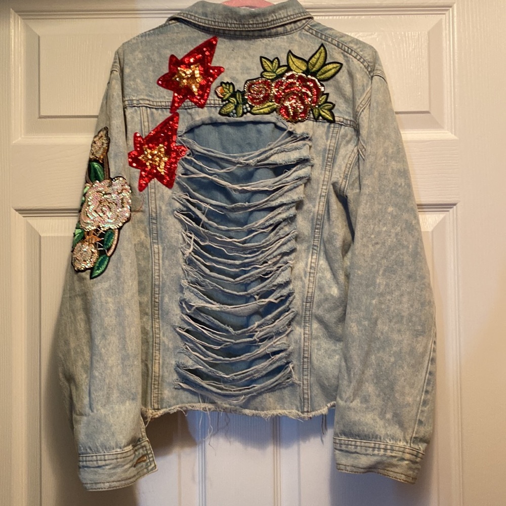 Distressed denim jacket with sequin appliqué